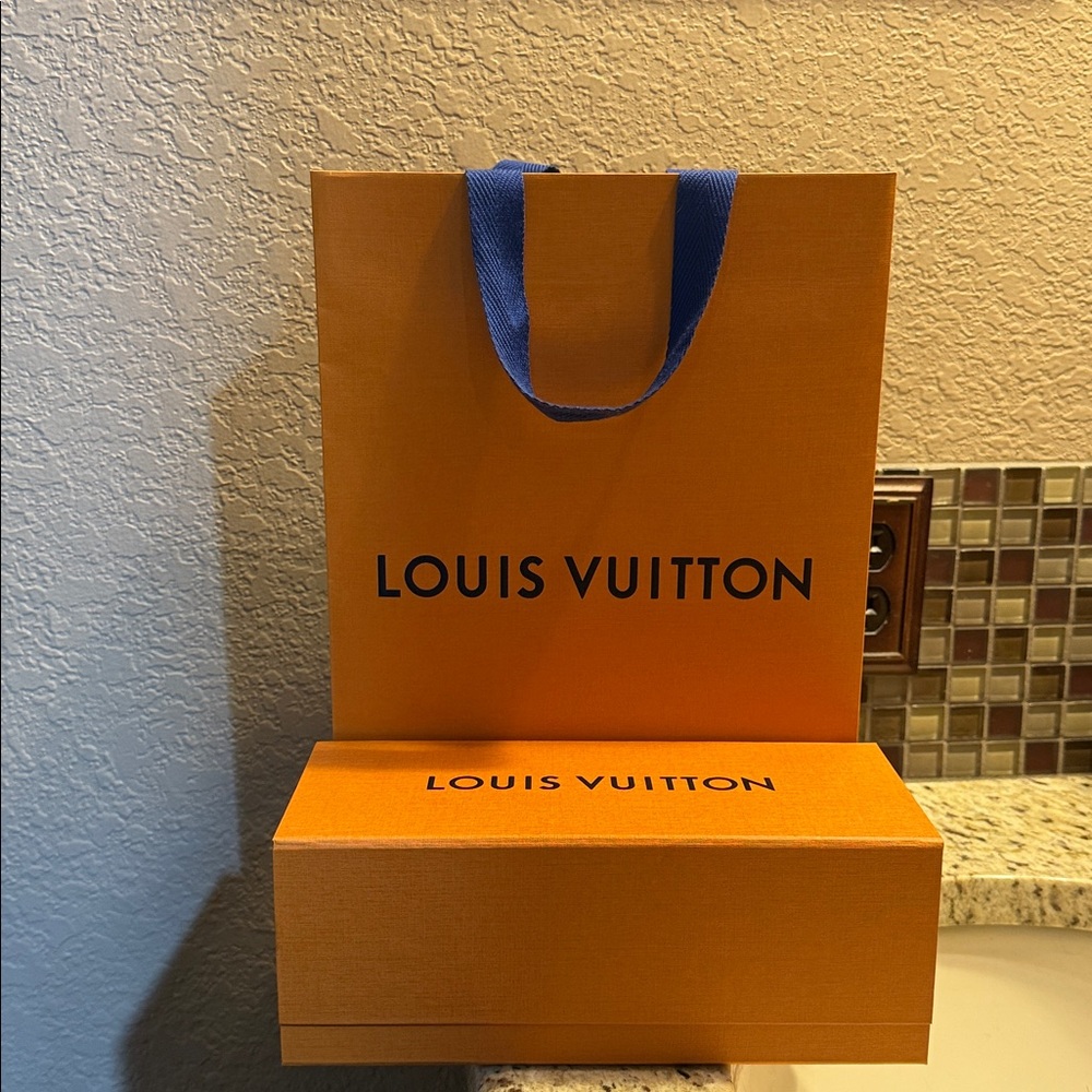 Louis Vuitton Orange boxes and bags